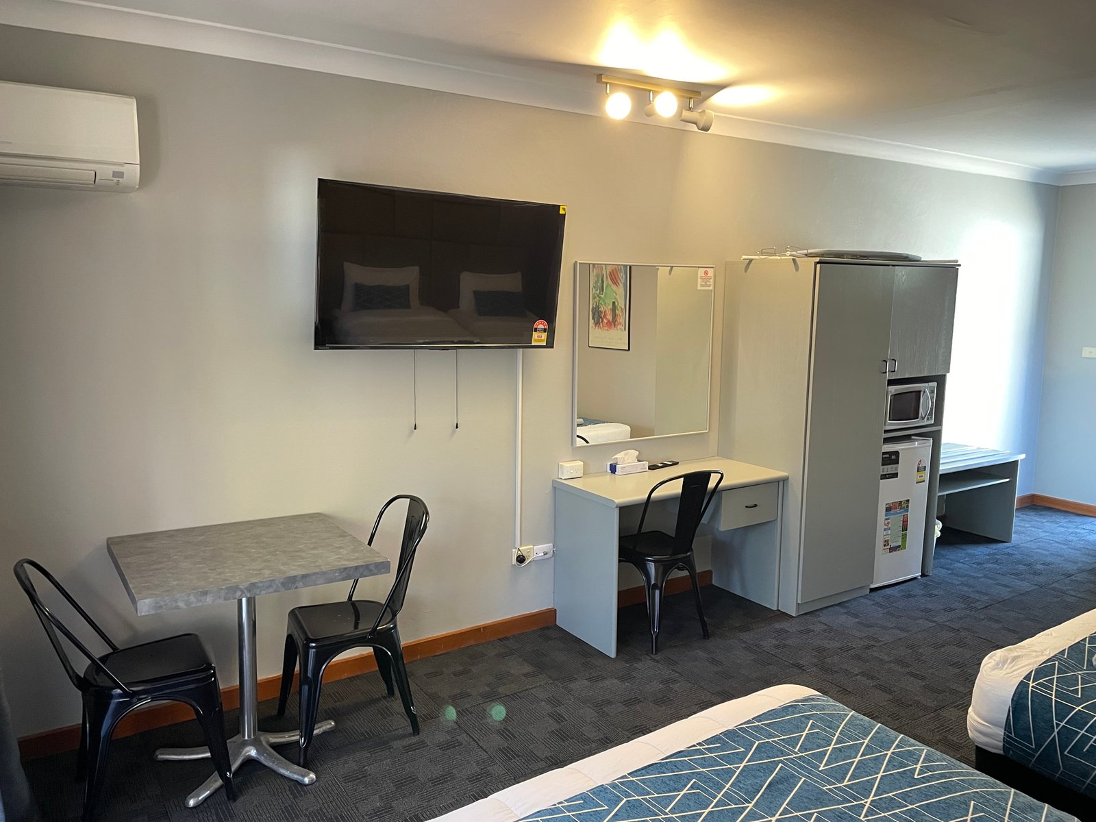 Family Room with Backyard View at Parkway Motel